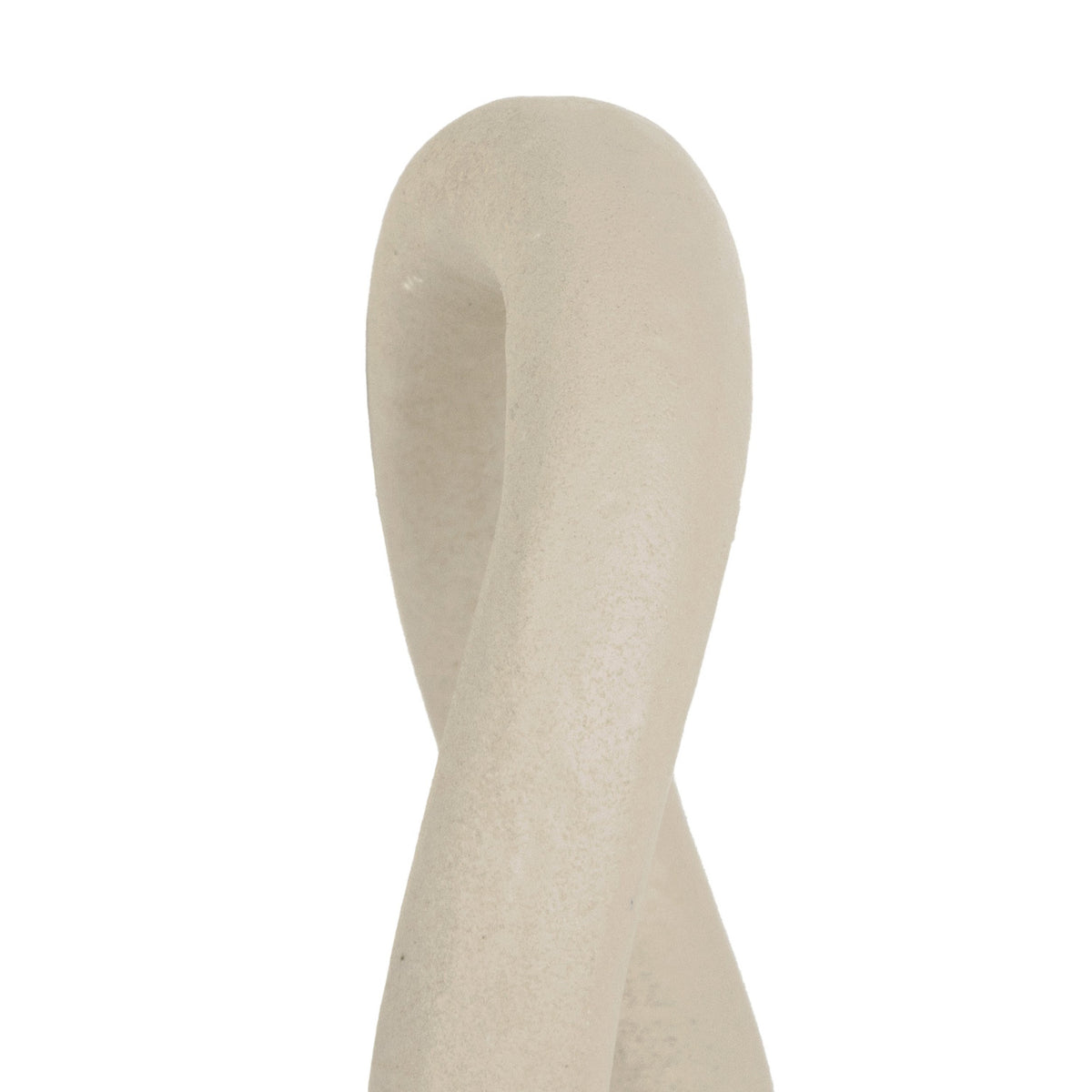 Ghorawal Napkin Ring in cream aluminium, shown close-up with a looped, pebble-like shape and matt speckled finish on a plain white background.