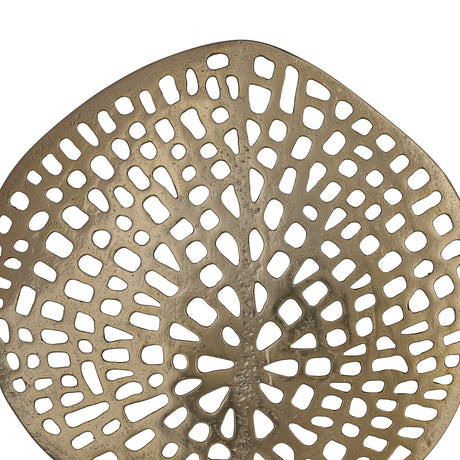 Gifu Sculpture, a close-up of a brass-coloured aluminium leaf form with an intricate pierced vein pattern, shown against a plain white background.