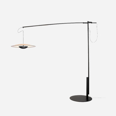 Introducing the Ginger LED Large Floor Lamp in Black & Oak: a sleek, contemporary design featuring a slender, tall stand with an extended arm that concludes in a round, flat light fixture, providing a warm glow. Ideal for modern interiors, it's elegantly showcased against a simple white background.