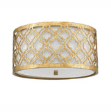 The Arabella 2 Light Flush - Gold With Ivory Shade features a drum-shaped distressed gold metal frame adorned with an elegant geometric lattice design. Its ivory interior gently diffuses energy-efficient lighting, enhancing the fixture's modern and sophisticated appeal.