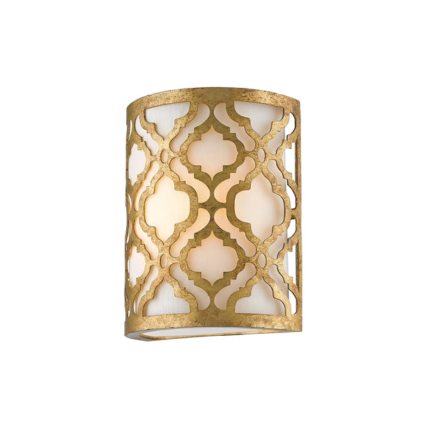 The Arabella 1 Light Wall Light - Gold With Ivory Shade features a gold, lattice-patterned metal frame with a frosted glass interior that emits a soft glow. Its geometric motif elegantly enhances your decor, while the gold metal finish adds sophistication and warmth to any space.