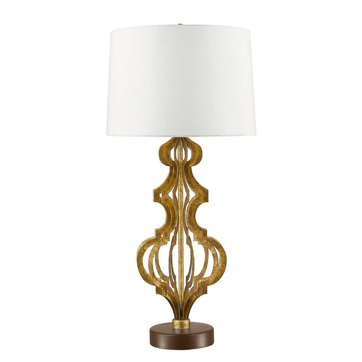 The Octavia 1 Light Table Lamp - Gold With Ivory Shade showcases an ornate gold metal base adorned with intricate scroll designs. It is topped with a cylindrical ivory linen shade and is elegantly supported by a round brown base, creating a stunning focal point in any room.