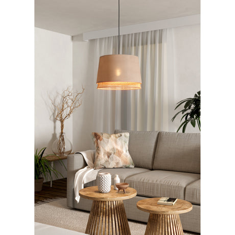 Golanne Wooden Pendant Light in black steel with a tapered natural fabric shade and woven wood band, hung above a coffee table in a living room with a grey sofa.