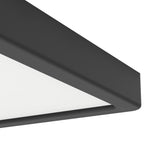 Close-up of the Gosmelle square LED downlight's corner, showing its matt black plastic frame and white diffuser panel, 22 x 22cm, IP44 rated.