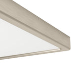Close-up corner view of the Gosmelle LED Downlight 39 x 39cm in satin nickel, showing the slim brushed steel frame and white plastic diffuser against a plain white background.