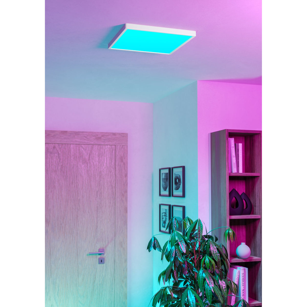 Gosmelle square smart LED downlight in white plastic, 39 x 39cm, mounted flush on a ceiling and glowing cyan-blue above a hallway with pink ambient lighting.