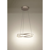 Guntin Pendant Light in bronze, featuring interlaced twisting steel bands with integrated LED diffusers, suspended on three slim wires from a round ceiling canopy against a plain light background.