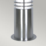 Close-up of the Sandbanks 1 Light Mini Bollard in silver against a neutral background. The cylindrical base features a white frosted shade accented by horizontal metal rings, providing sleek and contemporary outdoor lighting.