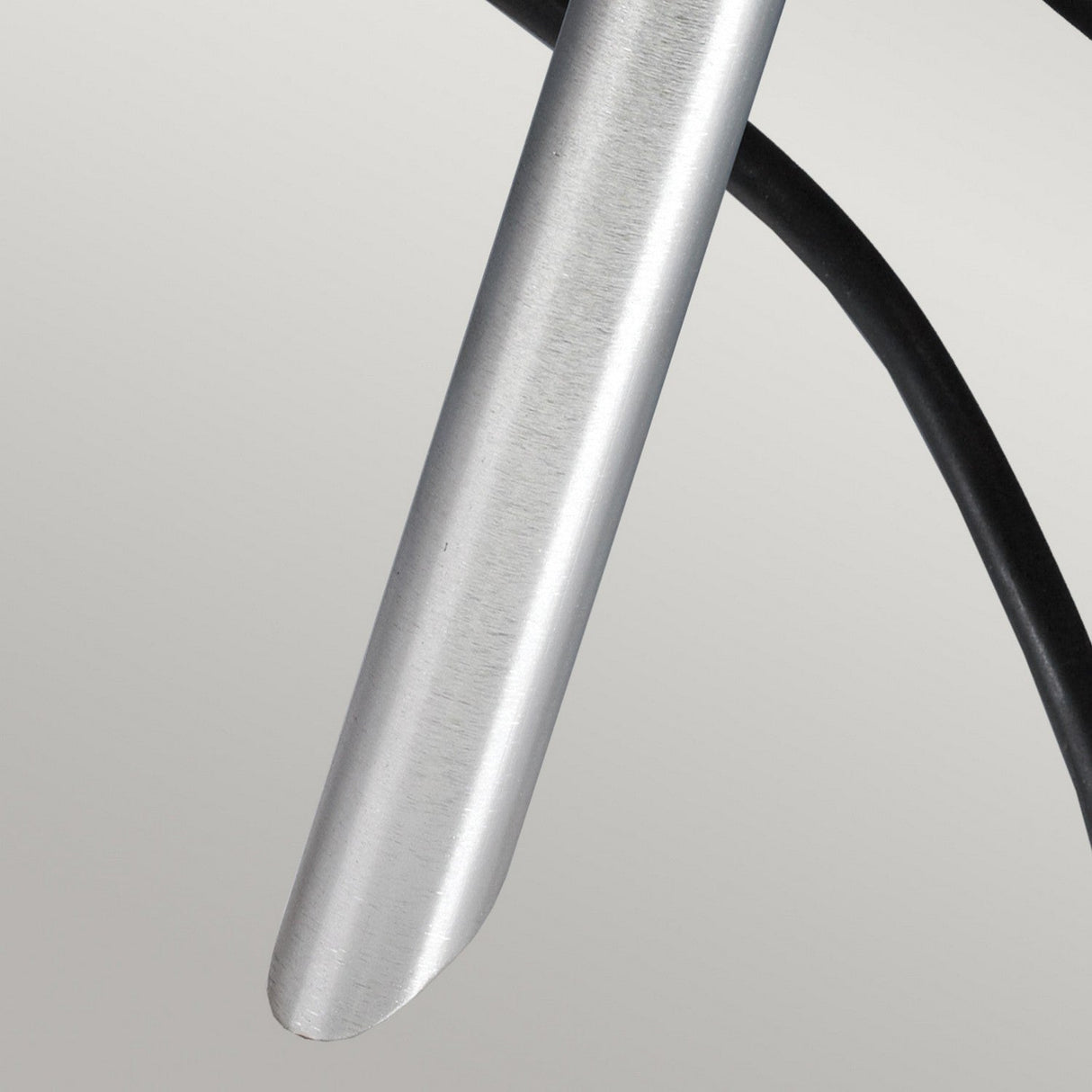 Close-up of a metallic probe with a rounded tip and attached black cable, set against a neutral background. The device is smooth and cylindrical, similar to components in the Spennymoor Kit, which includes 3 x 12V spotlights, 3 spikes, a 6m cable, and a 12V transformer in silver for precise installations.