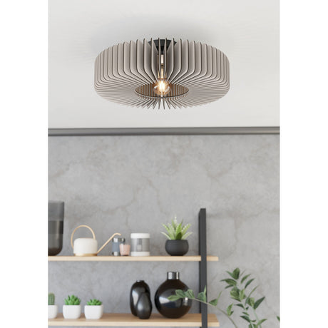 Halbanne Ceiling Light in black and grey, a round flush fixture with radiating wooden slats around a central bulb, shown mounted on a white ceiling above a styled shelf display.