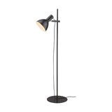 Baltimore Floor Lamp in black, tall slim rail on round disc base, adjustable cone shade with cream interior, on a plain white background.