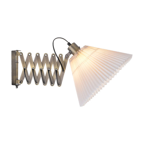 Medina X Wall Light in antique brass with an extendable scissor arm and a wide, pleated white conical shade, shown lit against a plain white background.
