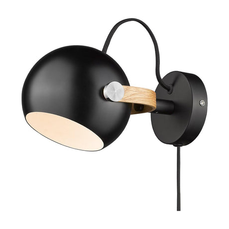 DC Wall Light 12cm in black and oak: a matte black sphere with white-lined opening on an oak yoke, adjustable via a knurled pivot screw, mounted on a round black backplate.