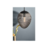 Woods Pendant Light 25cm in smoke grey textured glass with black ceiling fitting, shown against a grey wall beside a vase of flowers.