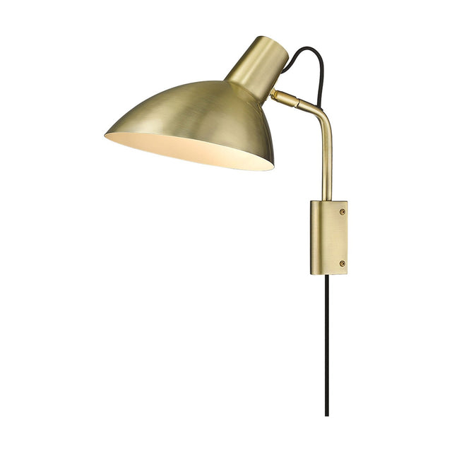 Metropole Wall Light in brass with a wide shallow dome shade, cream interior lining, adjustable knuckle joint, and rectangular wall plate, shown on a plain white background.