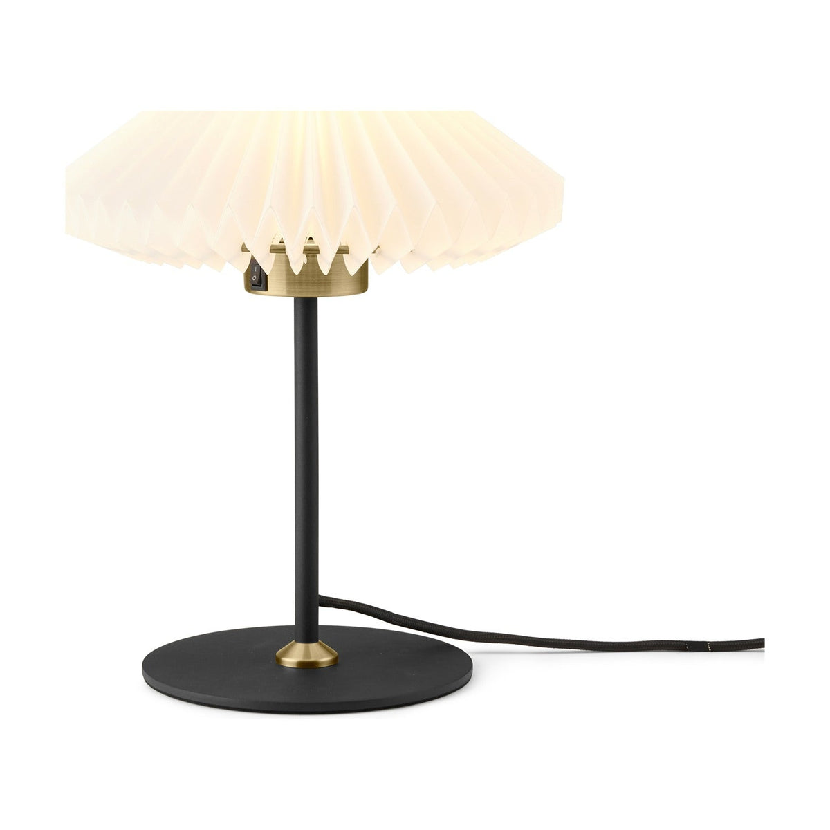 Paris Clean Table Lamp 24cm in white and black, featuring a pleated paper shade with pointed rim on a brass collar, slim black stem, and round base, shown on a plain white background.