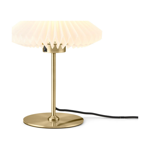 Paris Clean Table Lamp 24cm in white and antique brass, with a pleated paper shade on a slim brushed brass stem and round base, set against a plain white background.