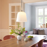 Room Pendant Light 30cm in opal glass with antique brass collar and black flex, shown above a dining table in a bright home setting.