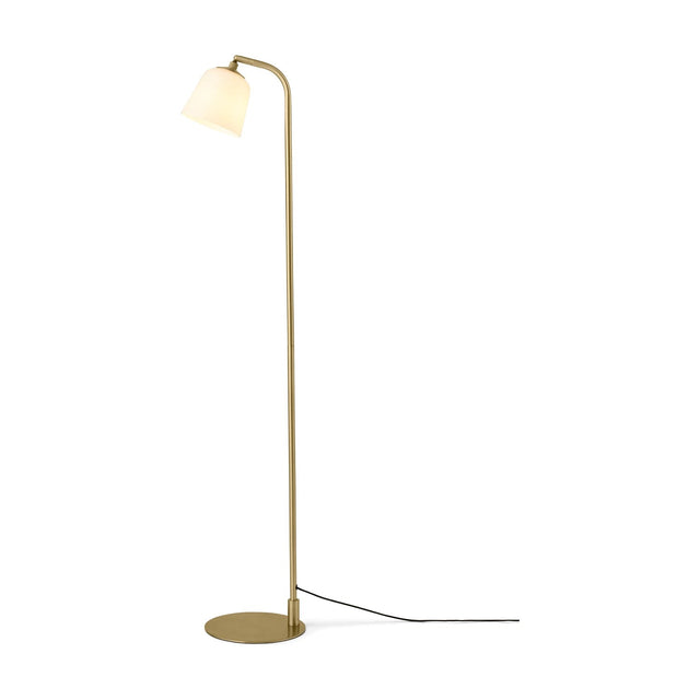 Room Floor Lamp with an opal glass bell shade tilted forward from a bent brass stem, set on a round antique brass disc base against a plain white background.
