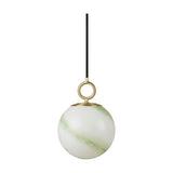Stockholm Pendant Light 18cm in Marble Green, an opal glass globe with green marbled streaks, hung from a brass ring fitting on a black cord, shown against a plain white background.