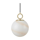 Stockholm Pendant Light 24cm in Marble Brown, an opal glass globe with sweeping amber marbling, suspended from a brass ring and cap on a black cord, shown on a plain white background.