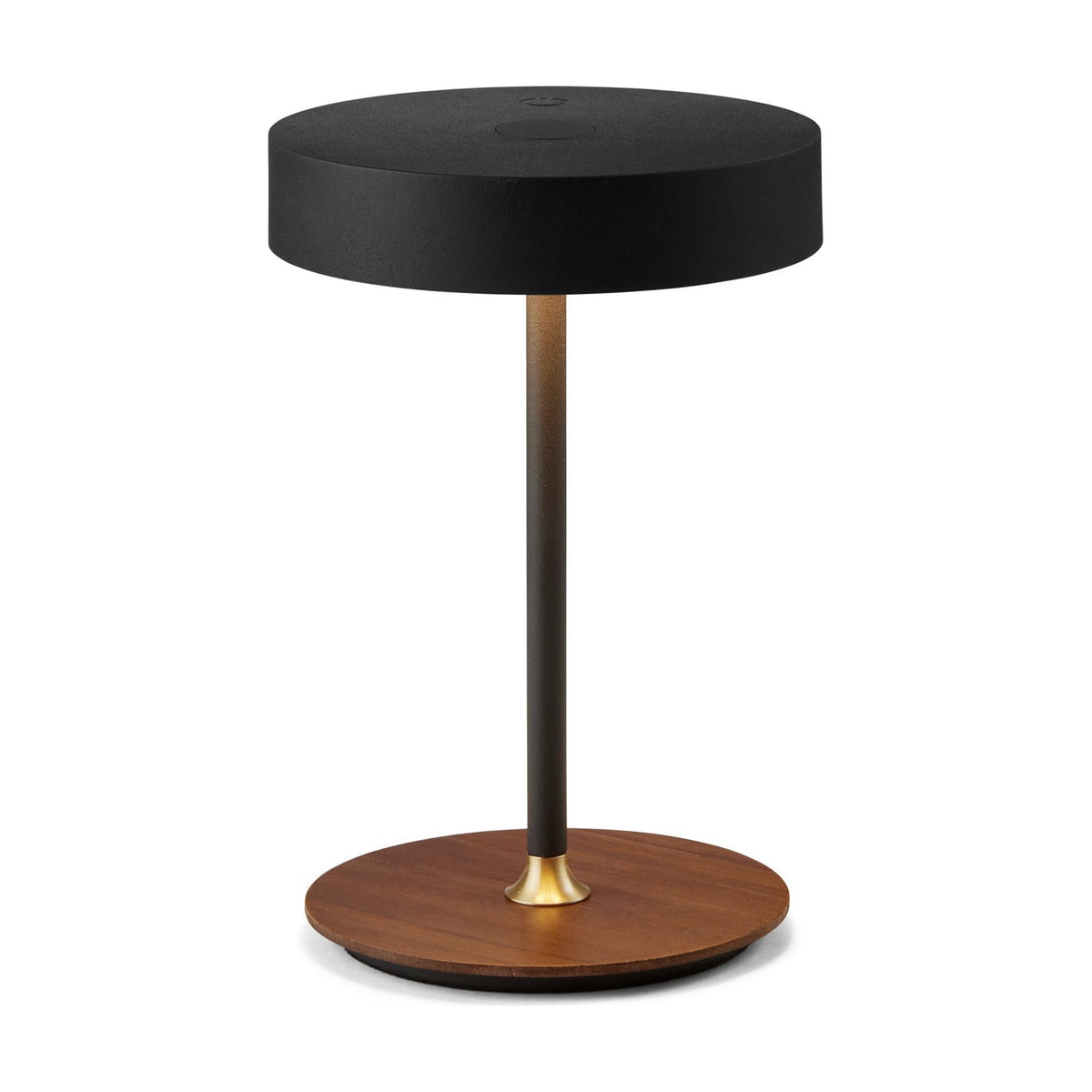 On the Move rechargeable LED table lamp with a black drum shade on a slim black stem, brass collar, and round walnut wood base, on a plain white background.