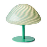 Mini Mush Glass Cable Table Lamp in turquoise, a wide dome shade with spiral fluted glass on a slim green metal stem and round base, shown on a plain white background.