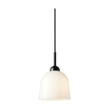 Glow Pendant Light 12cm, a single-light fixture with a bell-shaped opal white glass shade and black collar on a black flex cord, shown on a plain white background.