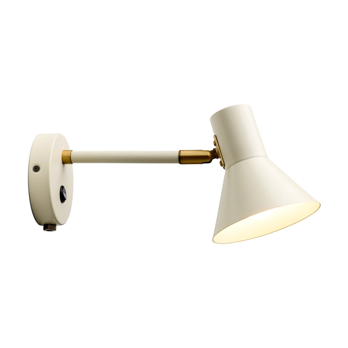 Style Wall Light in cream and antique brass, with a cone shade angled downward on a brass knuckle joint, straight arm, and round wall plate with switch, shown on a white background.