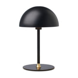 Boogie Table Lamp 16cm in matt black, featuring a dome-shaped shade on a slim stem with a brass accent at the round base, set against a plain white background.