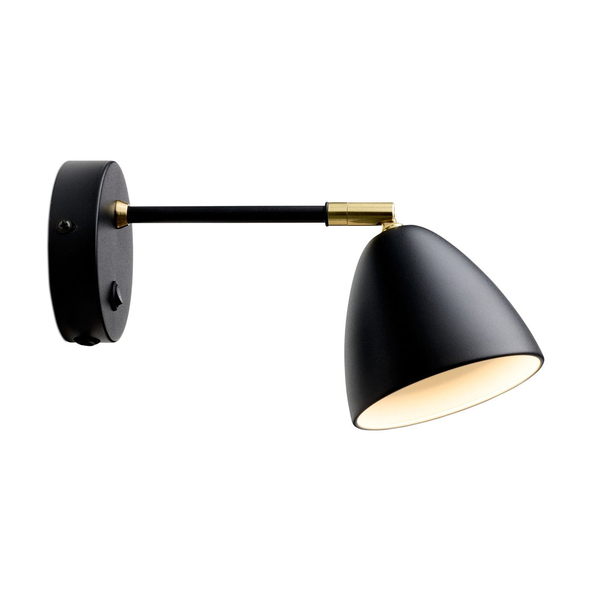Room Wall Light in black and brass, with a round wall plate, black arm, and downward-angled cone shade on a brass knuckle joint, shown on a plain white background.