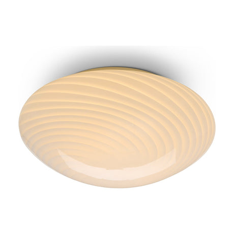 Candy Flush Ceiling Light 30cm in opal glass, a shallow dome with swirling ribbed texture in warm cream, shown against a plain white background.