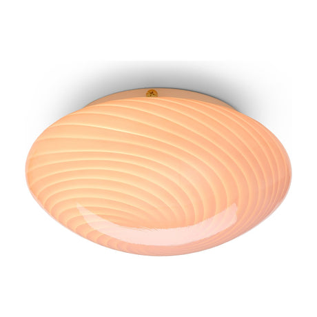 Candy Flush Ceiling Light 30cm in Rose – wide, shallow opal glass dome with a spiralling ribbed texture in soft pink, brass fixing screw visible, shown against a plain white background.