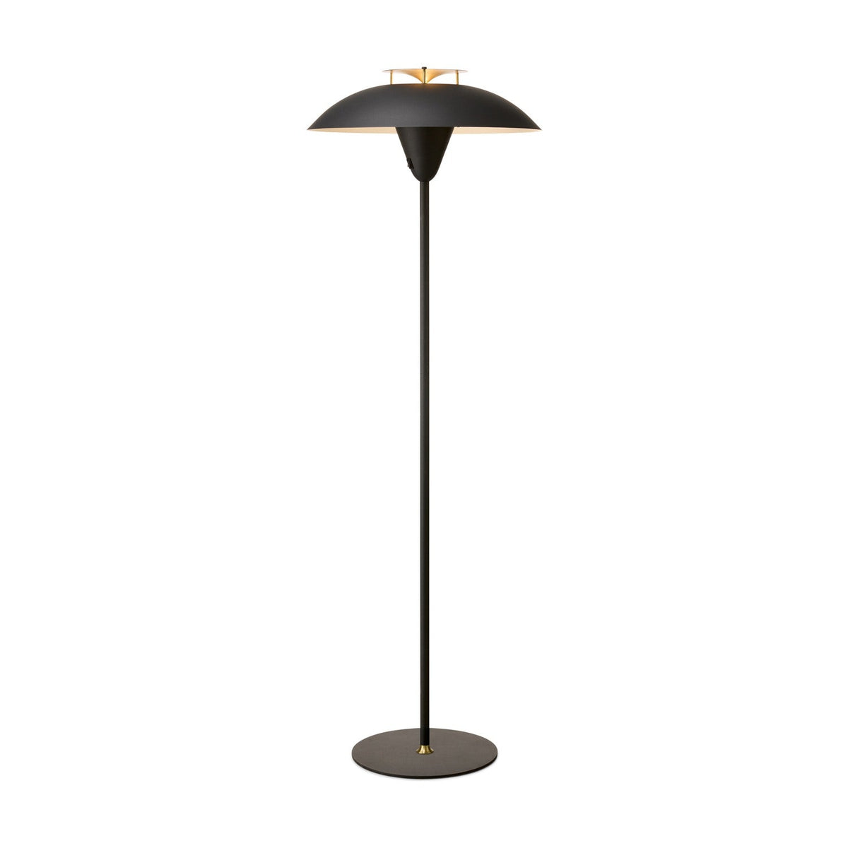 Stepp Floor Lamp in black with a wide shallow dome shade, antique brass fin detail at centre, slim stem and round base, shown on a plain white background.