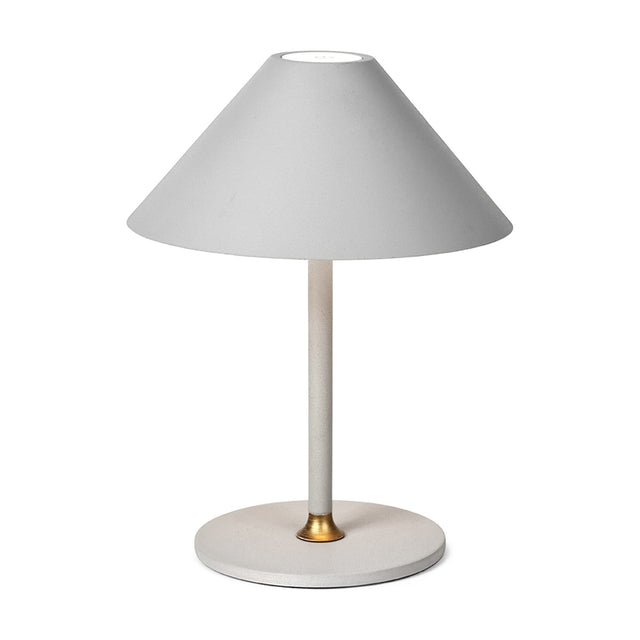 Hygge LED rechargeable outdoor table lamp in warm grey, with a wide cone shade, slim stem, brass collar, and round disc base on a plain white background.