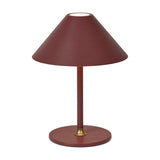 Hygge LED Rechargeable Outdoor Table Lamp in maroon, with a wide cone shade, slim stem, brass collar, and round flat base on a plain white background.