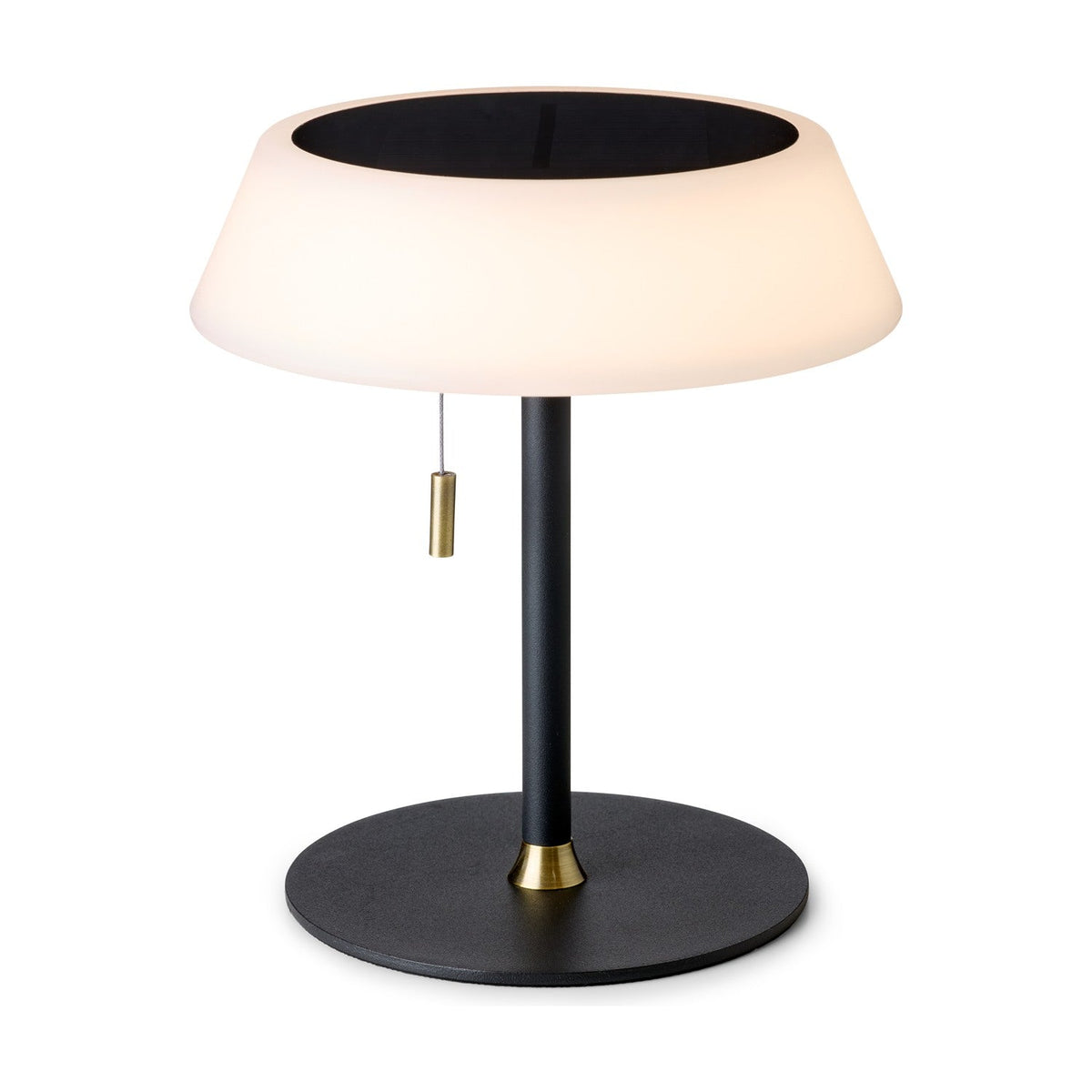Solar LED Portable Outdoor Table Lamp in black, with a wide ring-shaped opal glass shade on a slim black stem, brass pull toggle cord, and round black base on a plain white background.