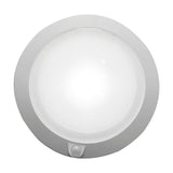 Push Rechargeable Flush Ceiling Light 18cm in white, round fitting with a prismatic gridded diffuser, wide plain rim, and a small sensor dome at the bottom edge, shown on a plain white background.