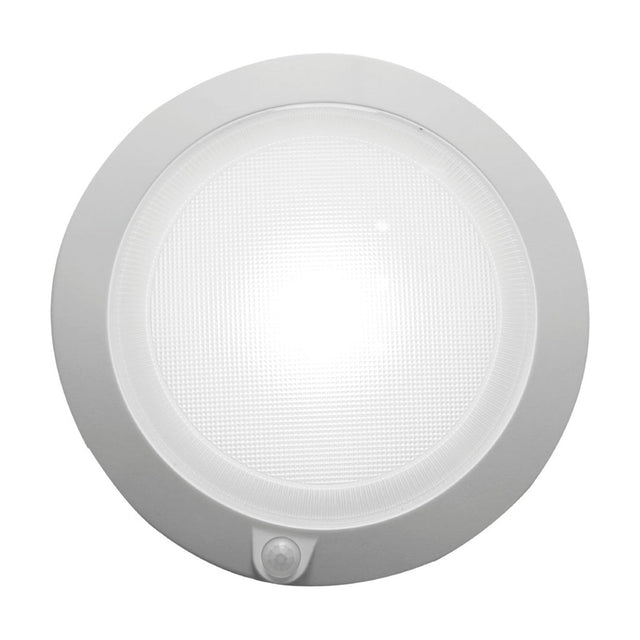 Push Rechargeable Flush Ceiling Light 18cm in white, round fitting with a prismatic gridded diffuser, wide plain rim, and a small sensor dome at the bottom edge, shown on a plain white background.