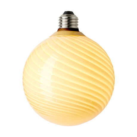 Colors Candy Bulb 12.5cm in cream, a round LED globe with twisted flute ribs spiralling from a silver screw cap, shown on a plain white background.