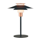 Rivoli 24cm table lamp in black and copper, with tiered black metal shades over an illuminated opal glass drum on a slim black stem and round base, shown on a white background.