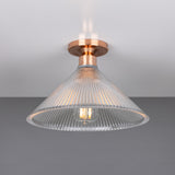 Hanoi Ribbed Glass Flush Ceiling Light with a cone-shaped clear ribbed glass shade and copper ceiling plate, lit E27 bulb visible, on a plain grey background.