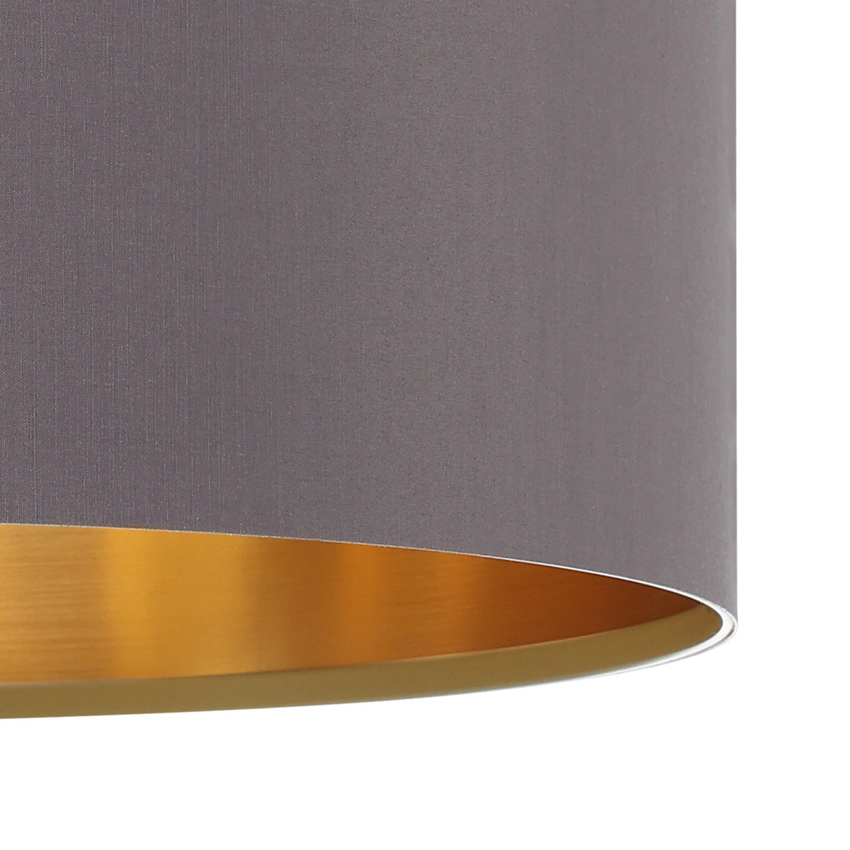 Close-up of the Hasanne fabric pendant light's drum shade, showing mocha fabric exterior and gold inner lining on a plain background.