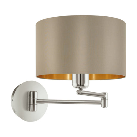 Hasanne Wall Light in satin nickel with a round wall plate, jointed swing arm, and a taupe fabric drum shade lined in gold, shown on a plain white background.