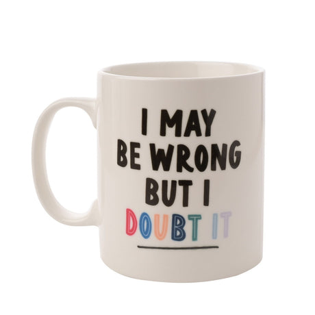 White gloss porcelain mug with C-handle, printed with "I May Be Wrong But I Doubt It" in black text and multicoloured "doubt it" lettering, shown on a plain background.