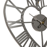 Close-up of the Open Frame Heart Roman Numeral wall clock in matt grey metal, showing the clock hands, central hub, and heart-shaped spokes against a white background.