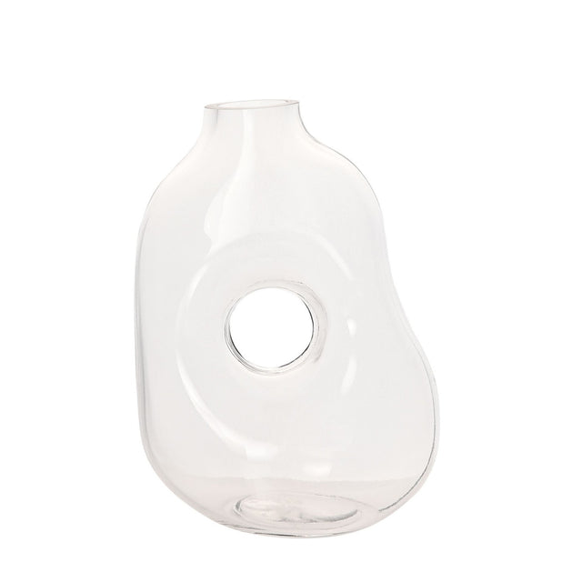 Abstract handmade clear glass vase with a short neck, softly rounded uneven body and a circular hole through its centre, shown on a plain white background.