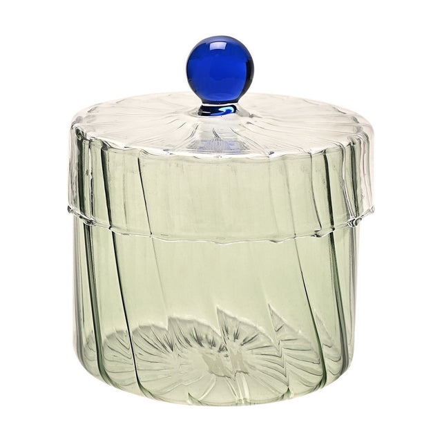 Round handmade glass trinket box with ribbed pale green base, clear ribbed lid, and a blue glass ball knob, shown on a plain white background.