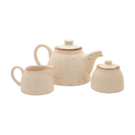 White stoneware tea set with brown speckles and brown-edged pieces, including a teapot, lidded sugar pot, and milk pot with pouring lip, on a white background.