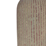 Close-up of the Slim Ribbed Bottle Ceramic Table Lamp base, showing fine vertical ribs and a weathered, flecked beige glaze on a tall rounded ceramic body.